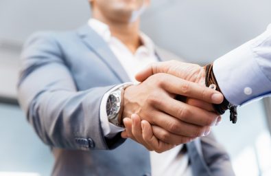 Handshake of businessmenoncepts - soft focus Handshake of businessmen greeting each other